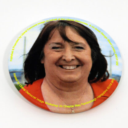 Round badge with picture of Christine Jardine