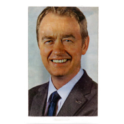 Clear plastic framed fridge magnet with picture of Tim Farron