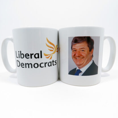 White mug with picture of Alistair Carmichael and Lib Dem name and logo