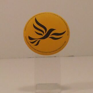 Yellow lapel badge with bird logo